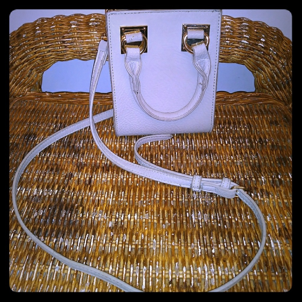 Madison west small cross body purse.